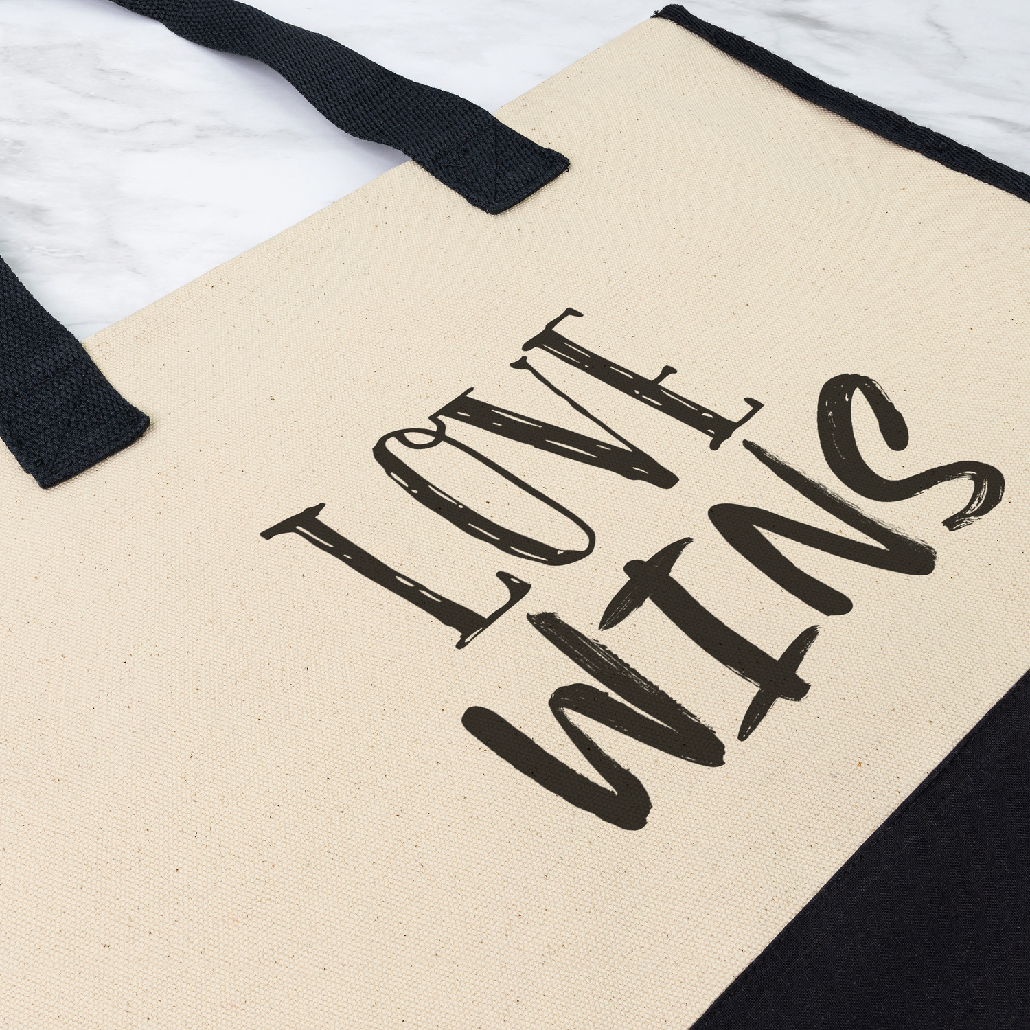 LOVE_WINS_Deluxe_Tote_PremiumTote_PrintDetail_Mockup.png